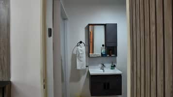 Departamento Confort, balcón | Baño | Pantuflas