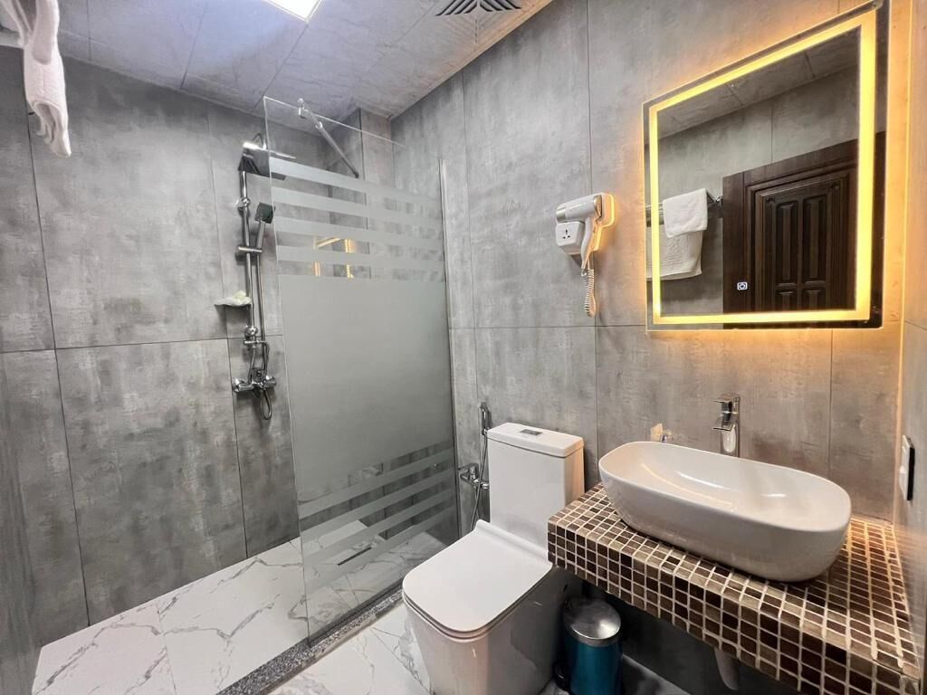 Standard Double Room, Balcony | Bathroom | Hair dryer, slippers, towels, soap