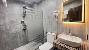 Standard Double Room, Balcony | Bathroom | Hair dryer, slippers, towels, soap