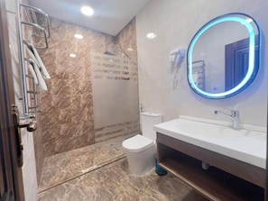 Hair dryer, slippers, towels, soap