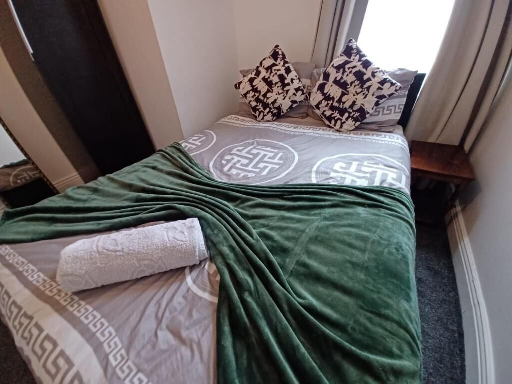 Deluxe dubbelrum - utsikt mot trädgården | Strykjärn/strykbräda och gratis wi-fi