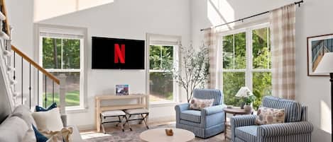 Smart TV, fireplace, books
