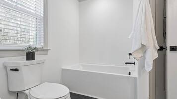 Hair dryer, towels, soap, toilet paper