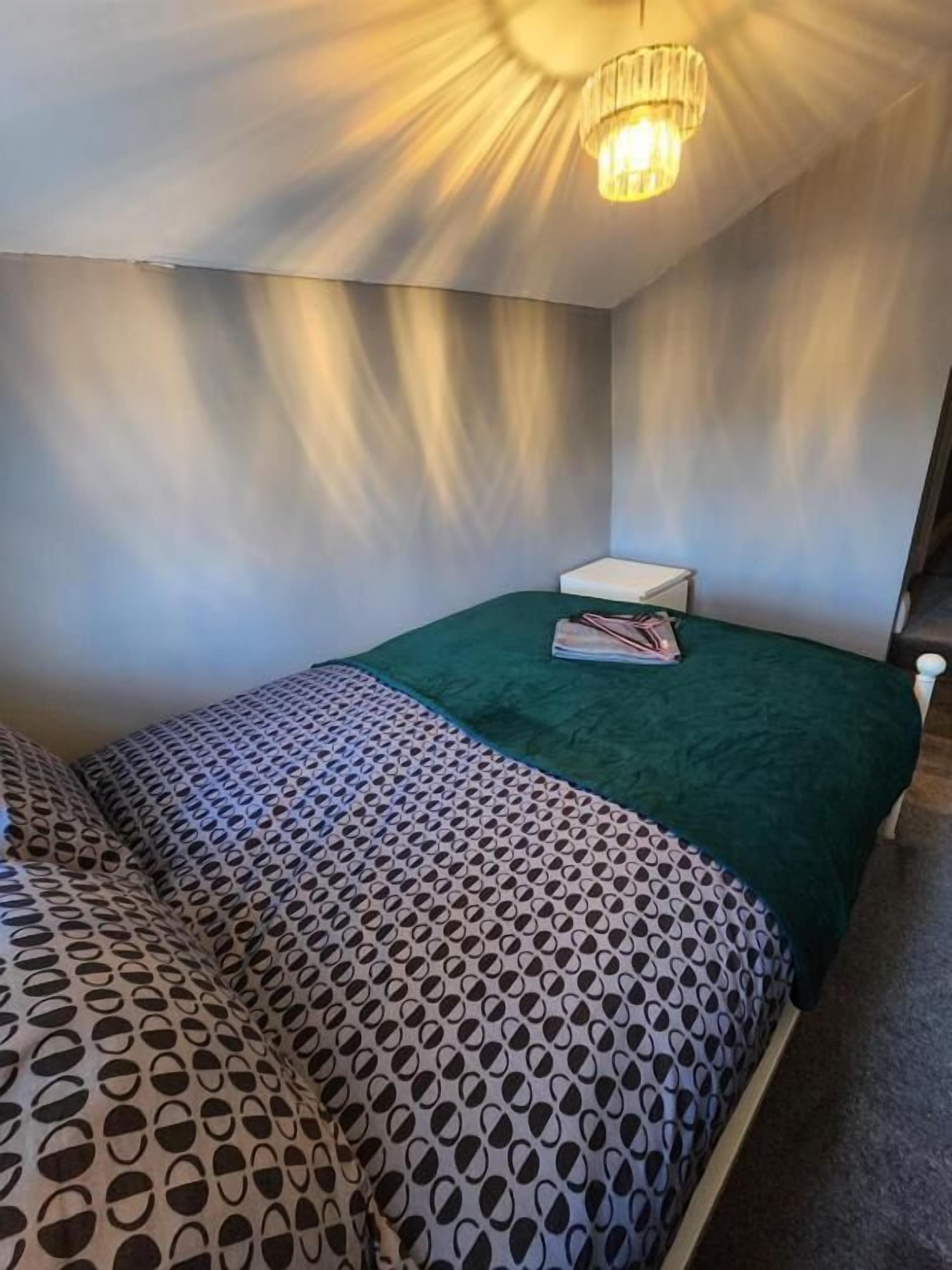 Deluxe dubbelrum - utsikt mot staden | Mörkläggningsgardiner, ljudisolering och gratis wi-fi