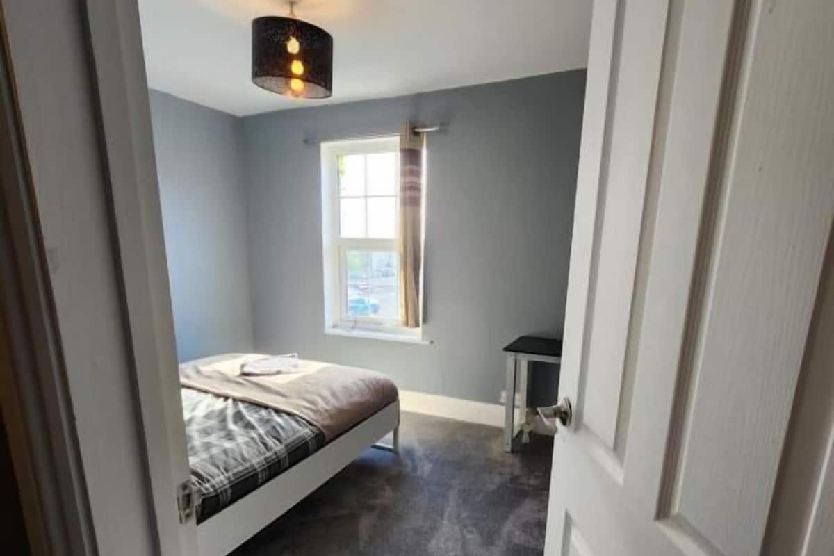 Habitación doble Deluxe, vista a la ciudad | Cortinas blackout, insonorización y wifi gratis 