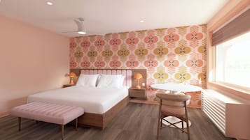 A bedroom with a bed, bedside tables, a round table, and a chair.
