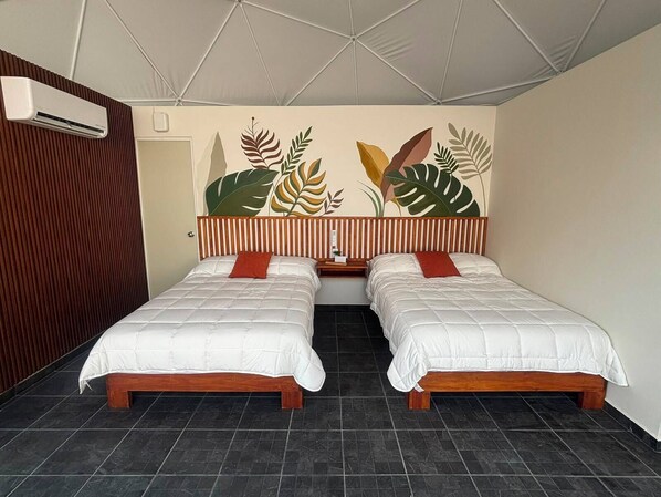 Habitación cuádruple Confort, vista al jardín | Wifi gratis 