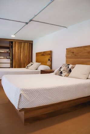 Family Loft, Balcony, City View | In-room safe, iron/ironing board (on request), WiFi (free) - San Felipe 668 (Guadalajara)