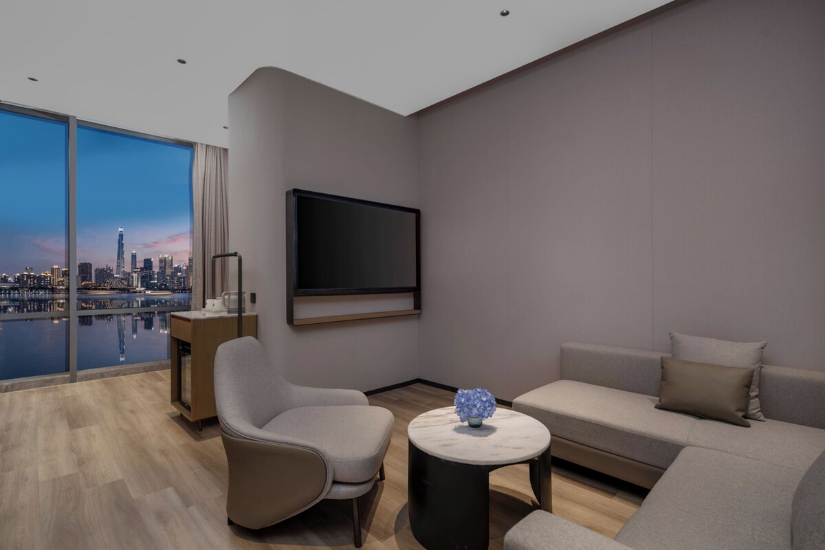 1 Bedroom Suite River View Balcony | Down comforters, desk, laptop workspace, blackout drapes