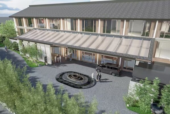 A modern building with a covered entrance, a circular driveway, and a car parked outside. - Holiday Inn Shanghai Zhujiajiao By Ihg (Shanghai)