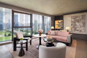 A modern living room with a city view, a sofa, a coffee table, and a chair. - InterContinental Shenzhen ICSZ (Shenzhen)