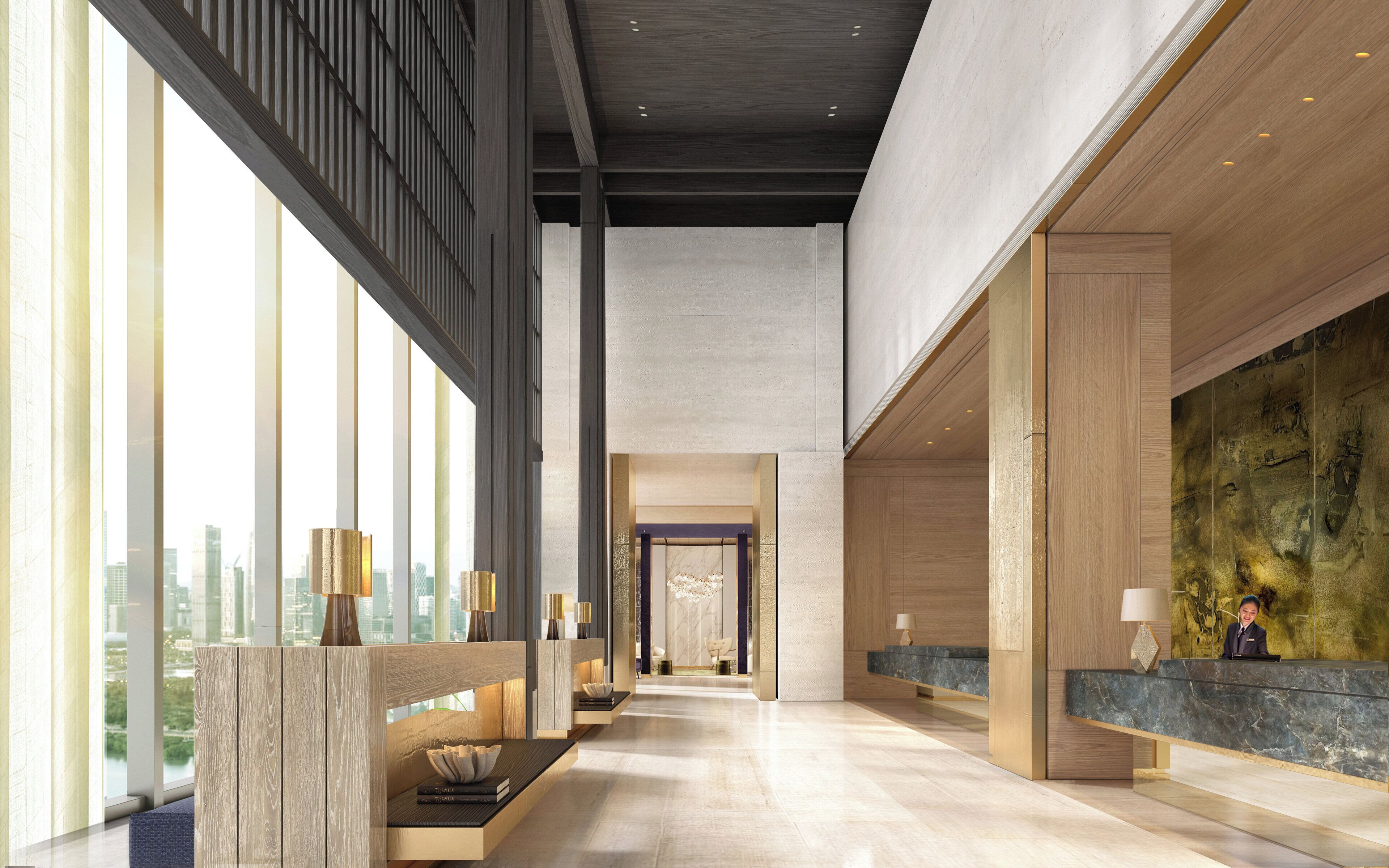 A modern hotel lobby with a reception desk, seating area, and large windows offering city views.