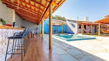 Indoor pool, pool umbrellas, pool loungers