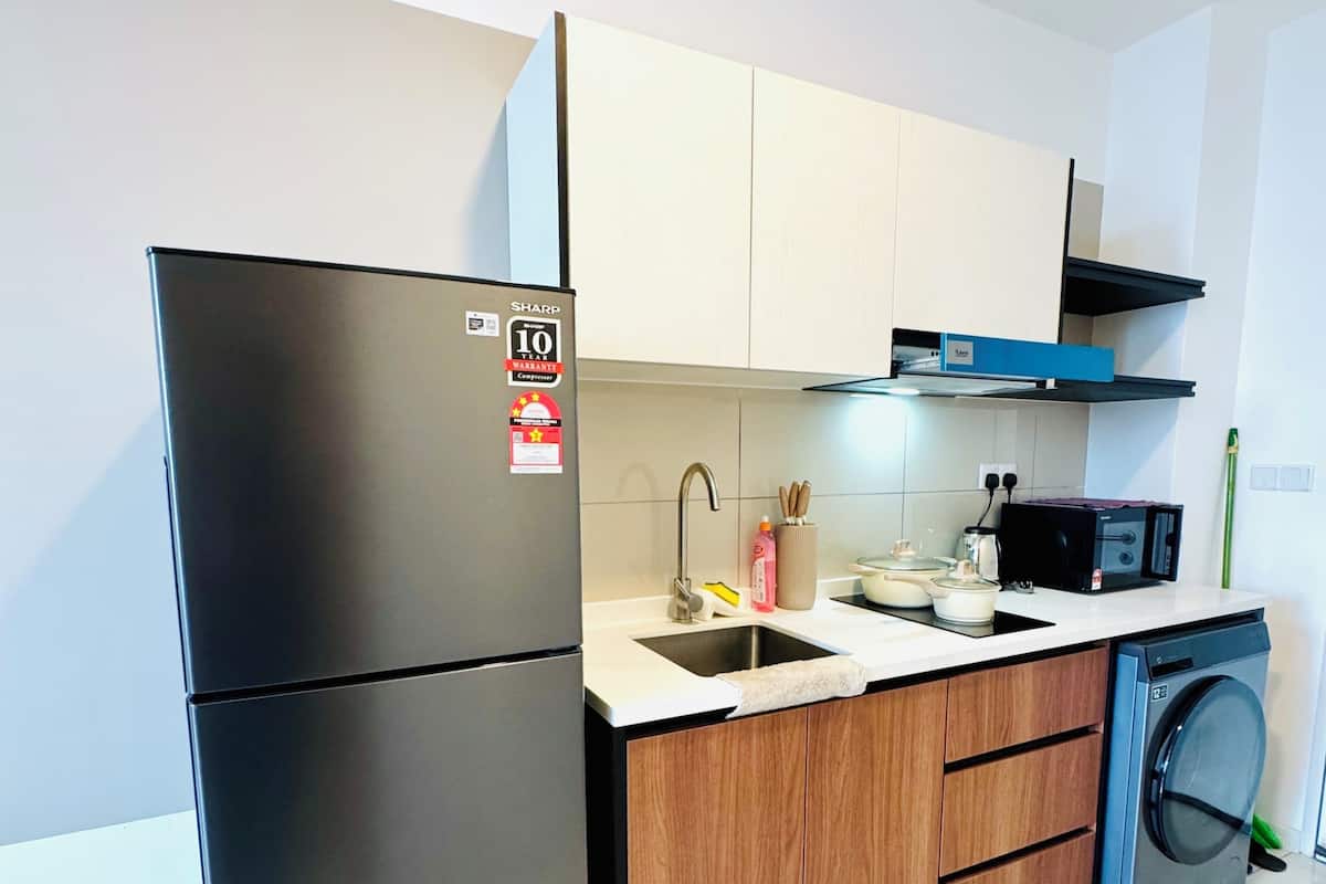 Family Suite, City View | Private kitchen | Fridge, microwave, stovetop