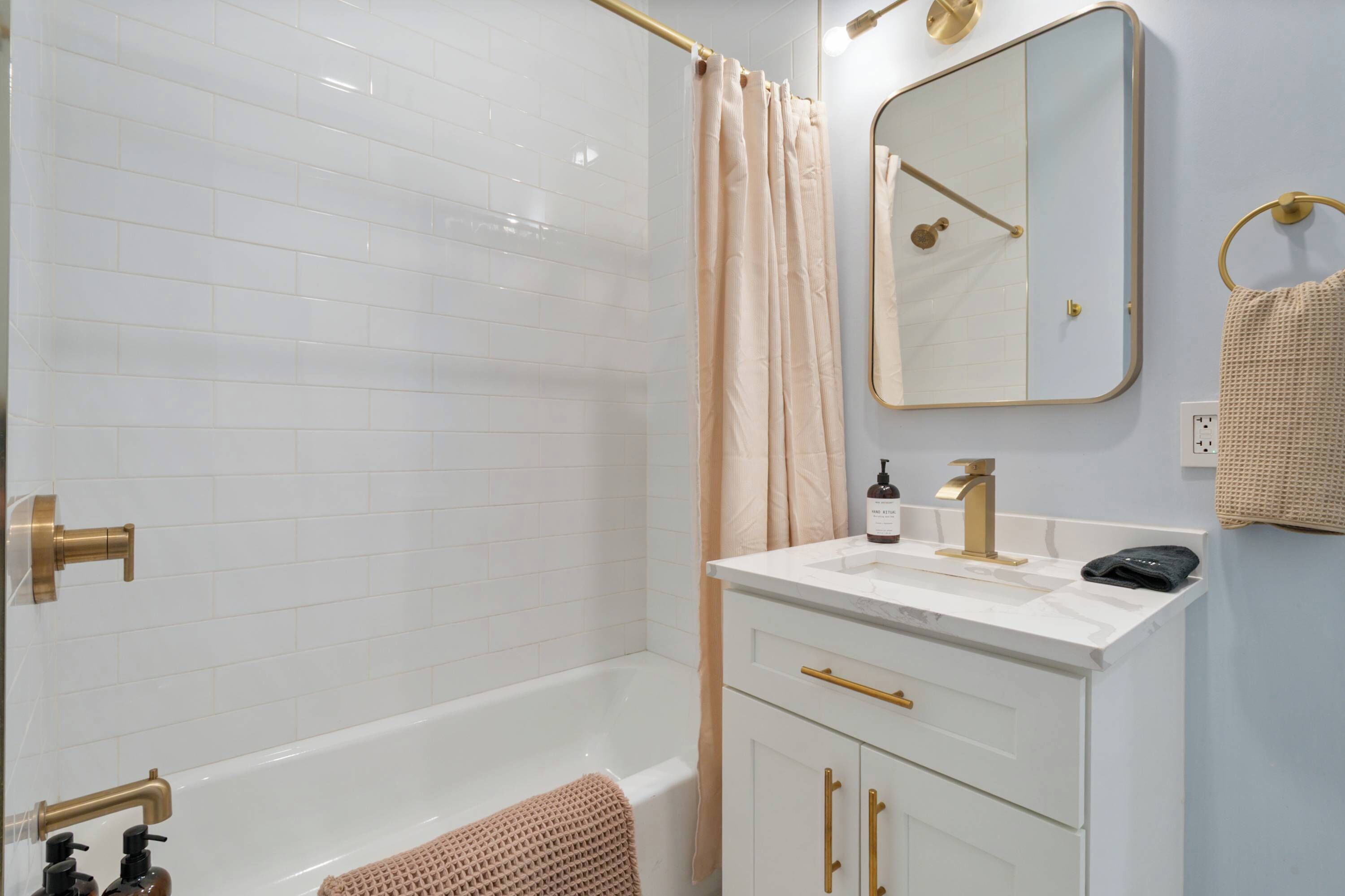 Shower, hair dryer, towels, shampoo