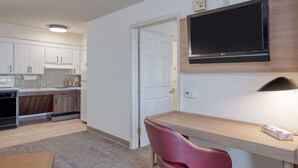 A modern kitchen with white cabinets, a microwave, and a dishwasher. - Accessible 1BR King Suite | Free Breakfast + Pool (Allentown)
