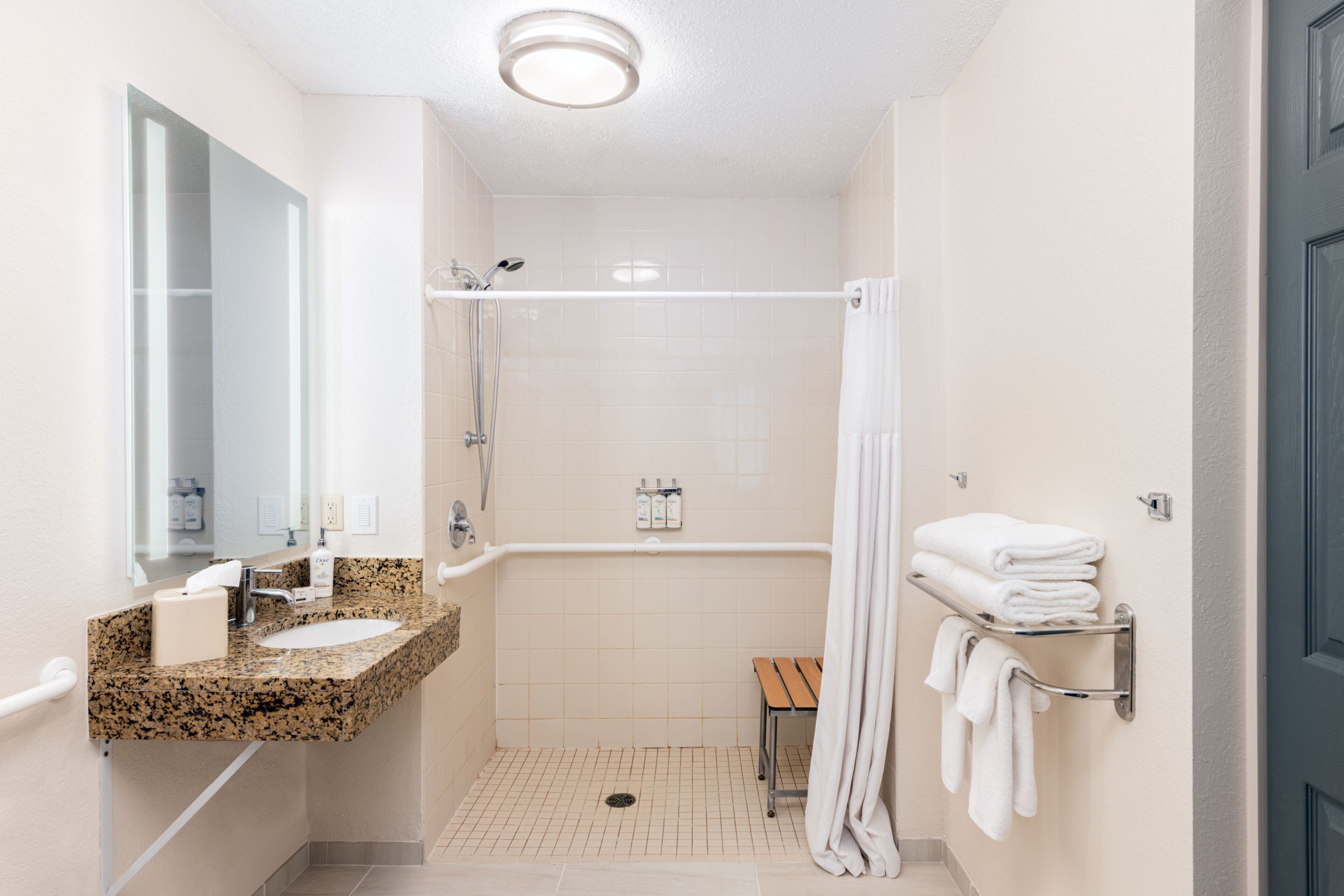 Hair dryer, towels, soap, shampoo
