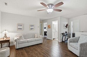 House, Multiple Beds (Sioux Trails Sunsets) | Living area - Lake Fun Retreat w/ Sunroom, PWC & Boat Slip, Dock Slide & Views (Osage Beach)