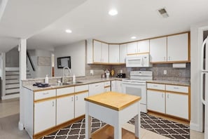 House, Multiple Beds (Sioux Trails Sunsets) | Private kitchen - Lake Fun Retreat w/ Sunroom, PWC & Boat Slip, Dock Slide & Views (Osage Beach)