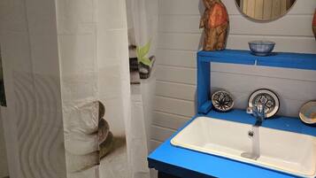 Chalet Confort, en la zona del jardín | Baño