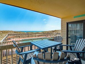 Outdoor dining - 5402 - Aquaholic - Oceanfront 2BR condo with pool, WiFi, and beach access. (Kill Devil Hills)