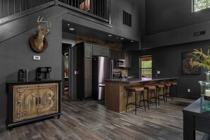 Coffee/tea maker, fridge, microwave, oven