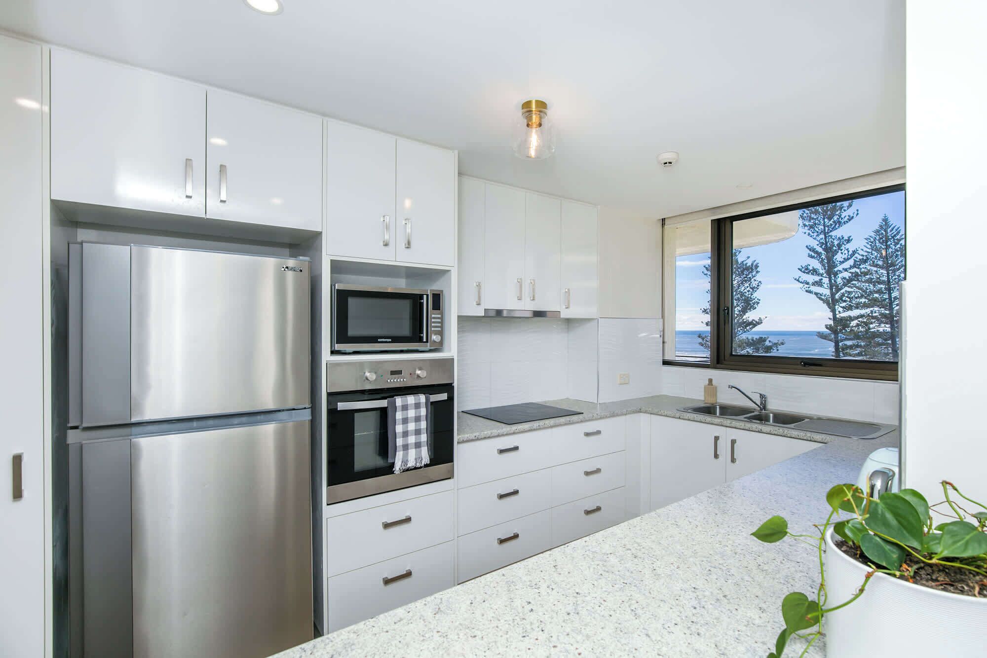Coffee/tea maker, fridge, microwave, oven