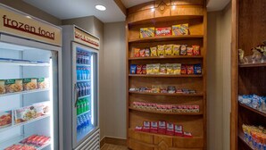A frozen food section with a variety of snacks and beverages. - Stretch Out and Settle In Near Greensboro Hotspots l Heated Pool & Breakfast (Greensboro)