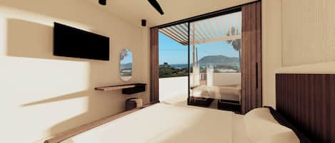 A modern bedroom with a bed, a TV mounted on the wall, a ceiling fan, and a large window offering a view of the sea and hills.