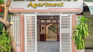 A building with a sign for 'LINH KHANG 2 Apartment' indicating the property name. - LINH KHANG 2 APARTMENT DA NANG (Da Nang)