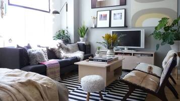Comfort Penthouse | Living area | 40-inch Smart TV with digital channels, offices, printers