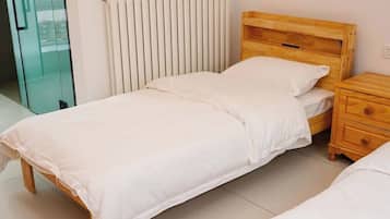Premium bedding, down comforters, laptop workspace, blackout drapes
