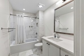 Bathroom - Design-Forward Downtown Condo • Walk to Broadway + Printer's Alley | Sound Check (Nashville)