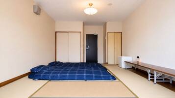 Standard Quadruple Room | Bed sheets