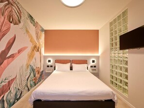 Premium bedding, down comforters, in-room safe, laptop workspace