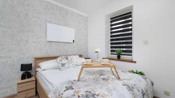1 slaapkamer, een strijkplank/strijkijzer, reisbedje, wifi