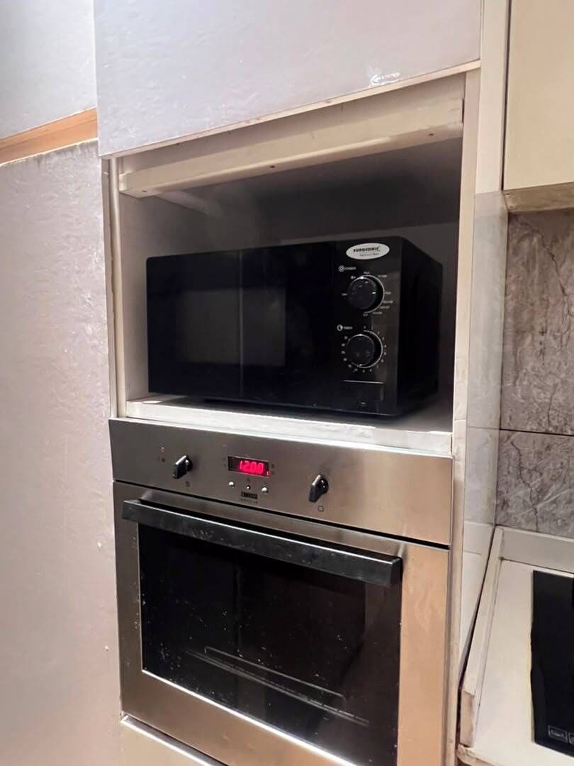 Family Apartment | Private kitchen | Full-sized fridge, microwave