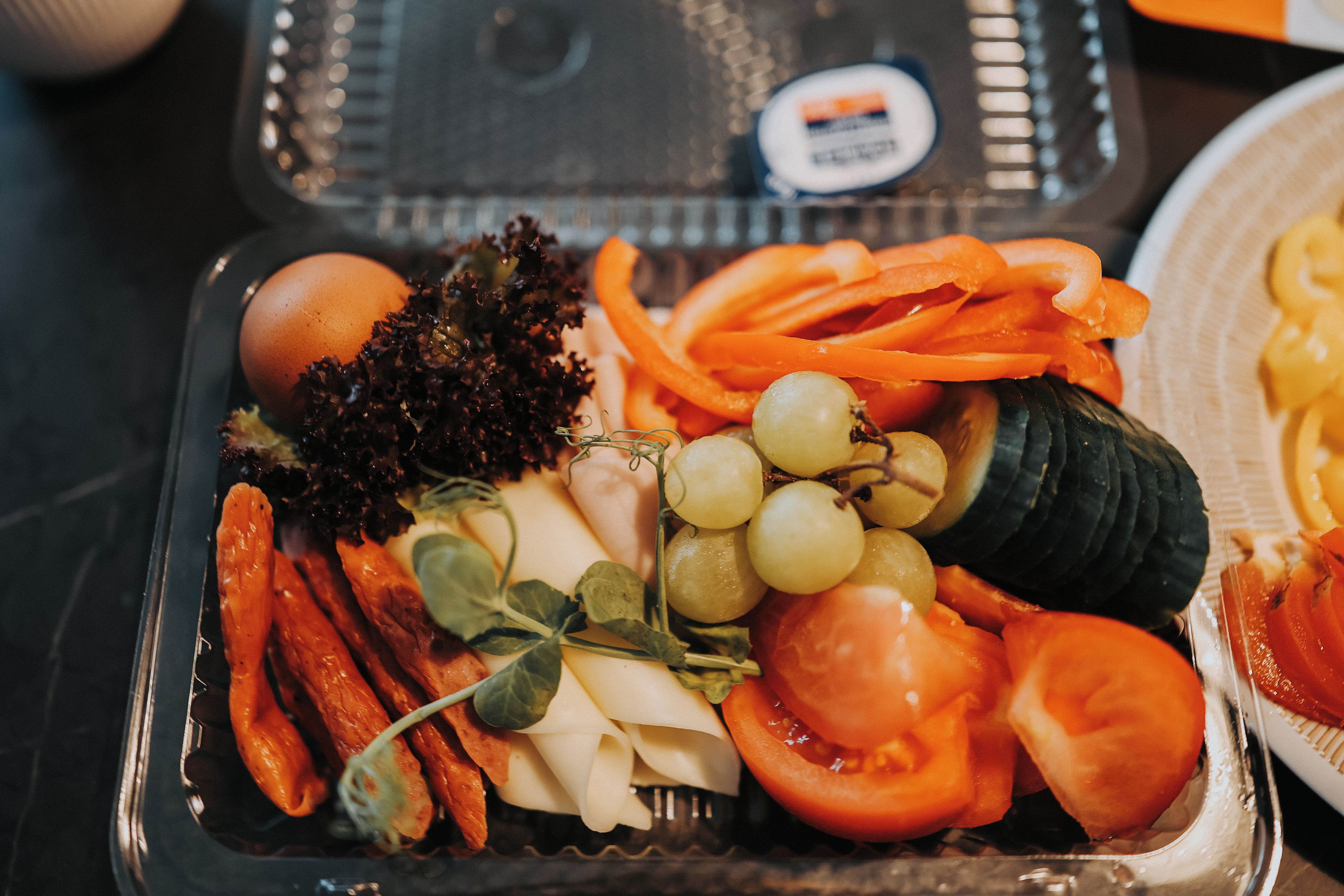 A meal with various vegetables and fruits.