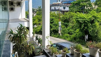 Double or Twin Room, Balcony, Garden View | Property grounds