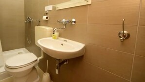 A bathroom with a toilet, sink, and shower. - Coastal Breeze House - House (Selca)