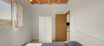Rural house 'Maset De La Salut' with mountain views, Wi-Fi, and air conditioning