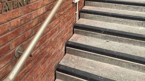 A brick wall with the text '4 BOTANICAL AVENUE' and a metal handrail leading up a set of concrete stairs. - Apartment in Botanical Gardens, Old Trafford (Stretford, old Trafford)