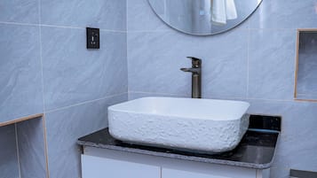 Slippers, towels, soap, toilet paper