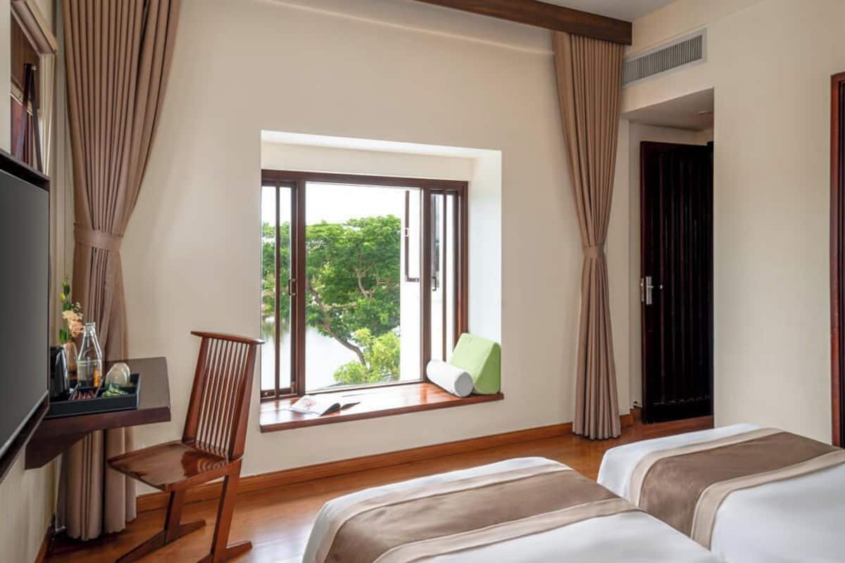 Grand Twin Room, River View | Minibar, in-room safe, desk, blackout curtains