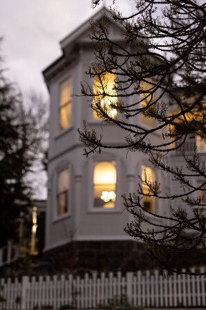 A two-story house with a white exterior and multiple windows. - Wahroonga on Bourke (Launceston)