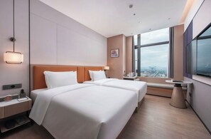 Habitació amb dos llits individuals empresarial, vistes a la ciutat | Caixa forta a l'habitació i cortines opaques 