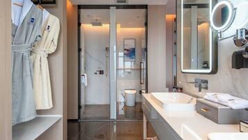 Luxury Suite, City View | Bathroom | Separate bathtub and shower, free toiletries, hair dryer, slippers