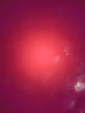 A blurred view of a room with a red hue. - Abcdefghil (Termoli)