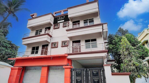 A multi-story building with a prominent sign on the top. - Collection O Ravi Talkies Bhubaneswar (Bhubaneshwar)