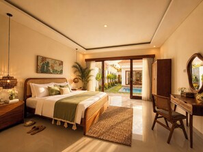 A bedroom with a bed, bedside table, lamp, and a view of a pool and garden. - 2 Bedroom Pavilion Pool Villa Canggu (Bali)